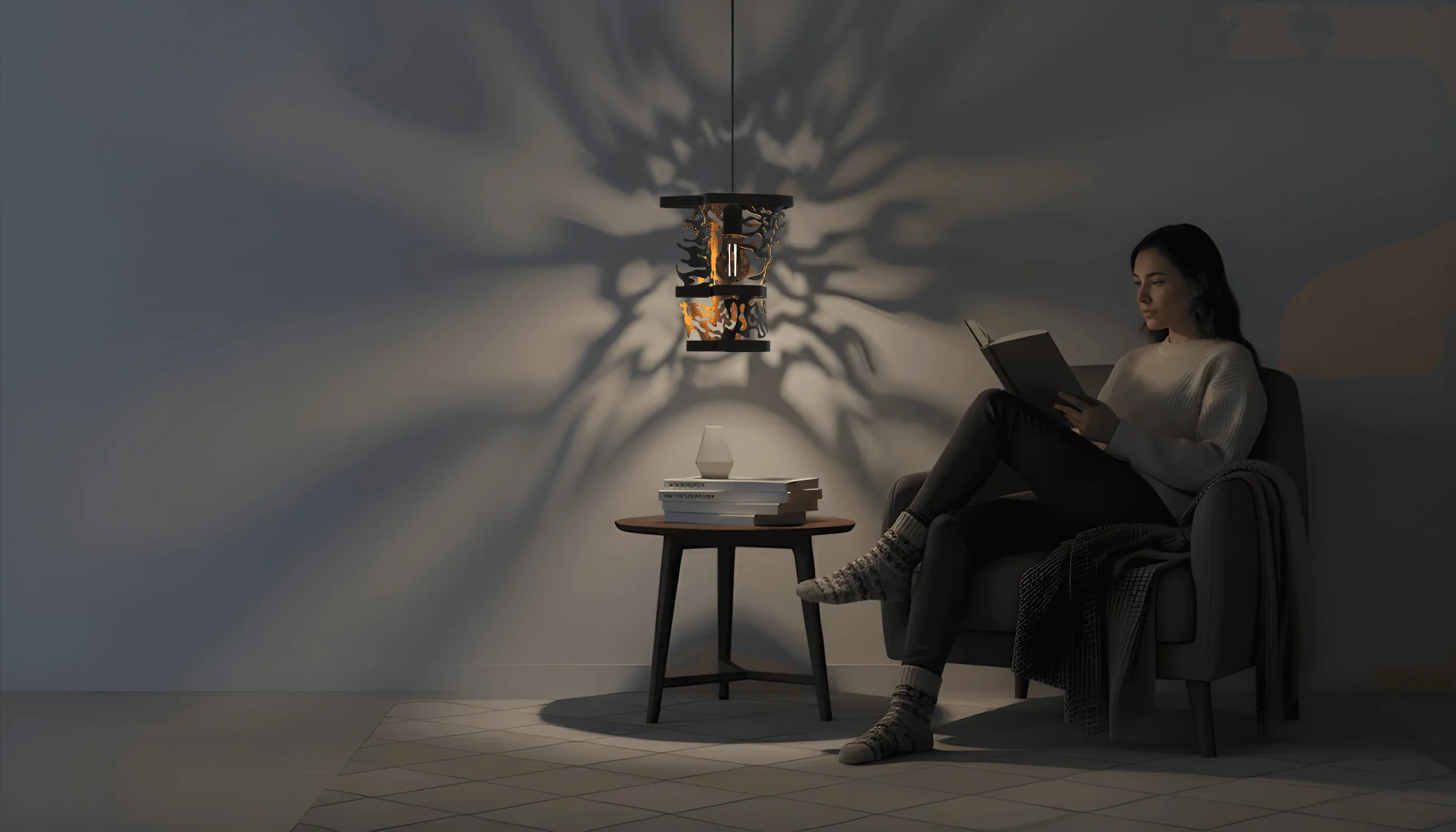 Distortion, a pendant lamp of layered plasma-cut steel discs finished in matte black.