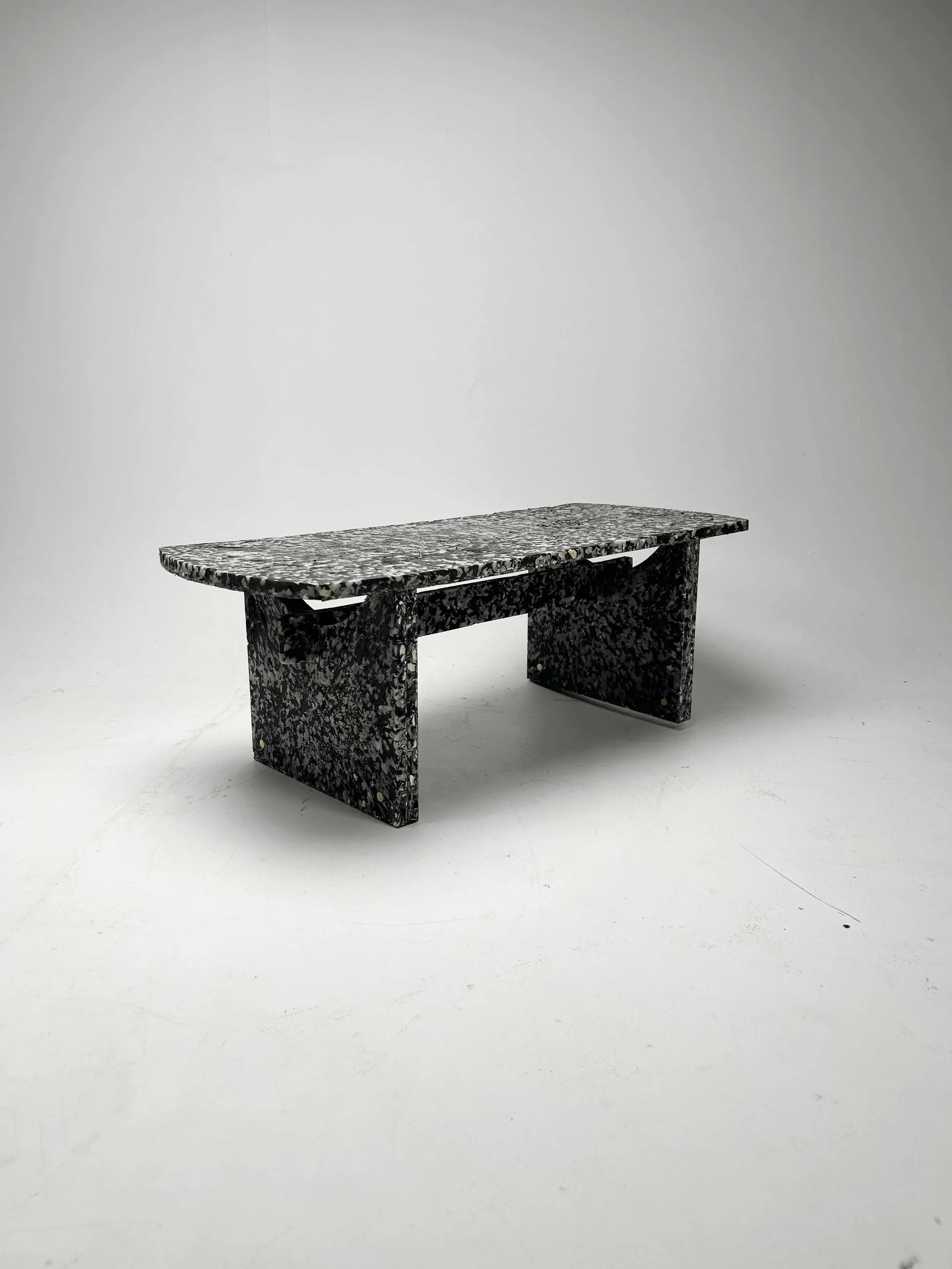 Pressed sheet — crushed shell suspended in recycled HDPE
